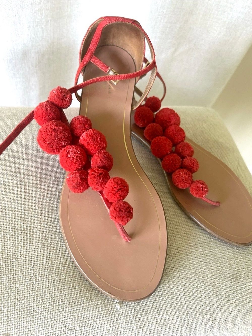 Aquazzura Red Pom-Pom T-Strap Sandals